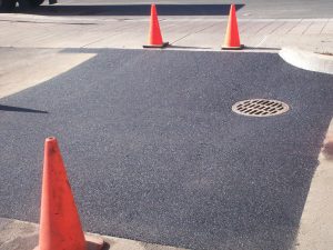 newly installed asphalt parking lot repair