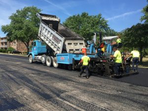 Ruston Paving installing asphalt at Clayton Arms Apartments in Rochester