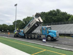 Ruston Paving crew in Northern VA paves the running track at Chantilly High School in Chantilly, VA