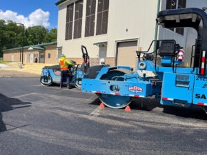 Compacting asphalt pavement at Cargill Deicing Technology in Lansing, NY