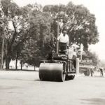 Ruston Paving installing asphalt with vintage dump truck and roller in Syracuse