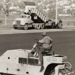Ruston Paving installing asphalt with vintage dump truck and Ingram roller in Syracuse