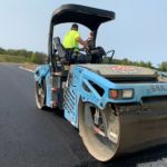 Ruston Paving compacting asphalt at Hathaway's Corners in Farmington, NY