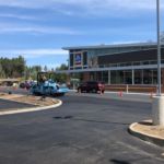 Compacting fresh pavement at Aldi's in Saranac Lake, NY